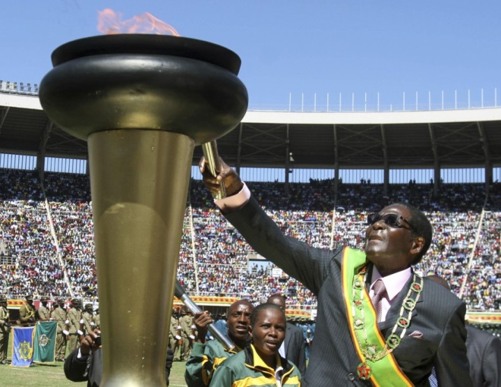 President Mugabe lights the Independence torch